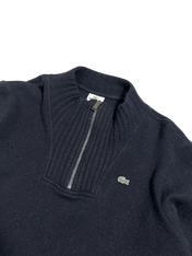 Sötétkék Lacoste félcipzáros kötött pulóver, vintage streetwear stílusban.